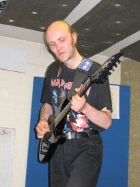 Saku Ovaska playing his guitar